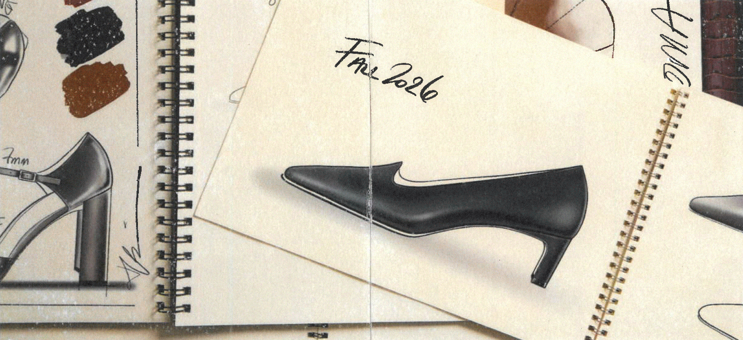 Heel design sketches beside rolls of leather in the Inez workshop
